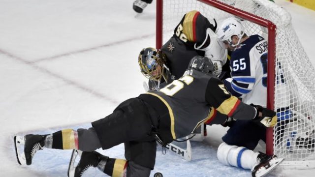 375539_mark scheifele marc andre fleury erik haula 676x496.jpg