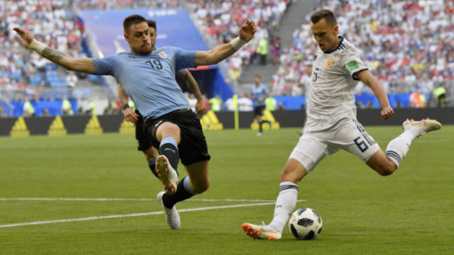 379381_russia_soccer_wcup_uruguay_russia_01540 4c0568489d1240f08b4d33233e164620 676x449.jpg