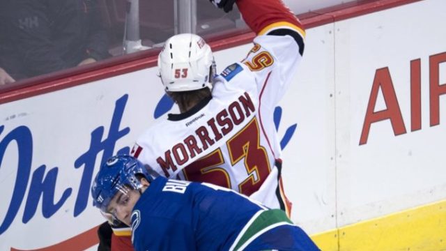 380868_flames_canucks_hockey 3777b85e36014f8ab7c8225f308e8183 676x480.jpeg
