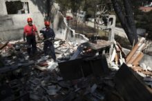 383585_greece_forest_fires_98719 0c91e0b67b3045b7968000a855ca6e4f 676x451.jpg