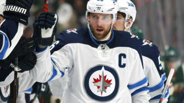 385786_jets_wheeler_hockey_65166 28126bae9cc44e4d818a7a5740dab1be 676x567.jpg