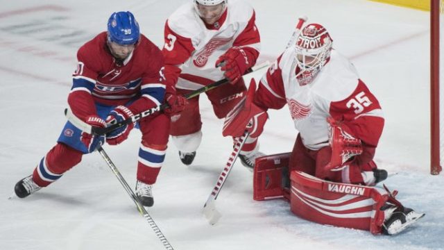 389902_jimmy howard nick jensen tomas tatar 676x468.jpg