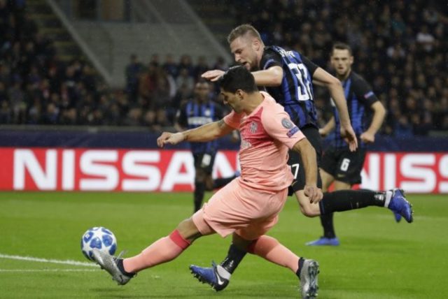 392078_skriniar suarez 676x452.jpg