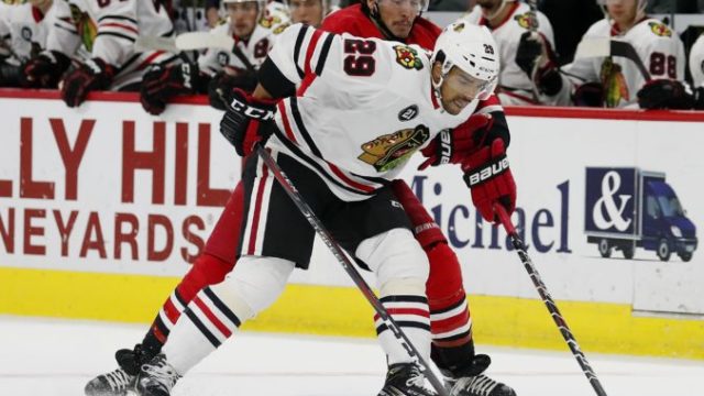392784_andreas martinsen justin faulk 676x520.jpg
