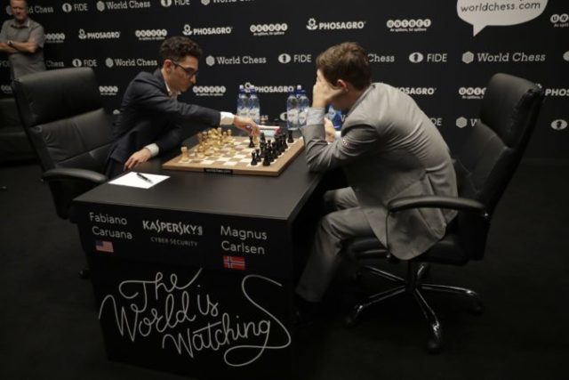 393412_magnus carlsen fabiano caruana 676x451.jpg