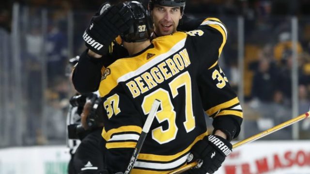 393776_patrice bergeron zdeno chara 676x511.jpg