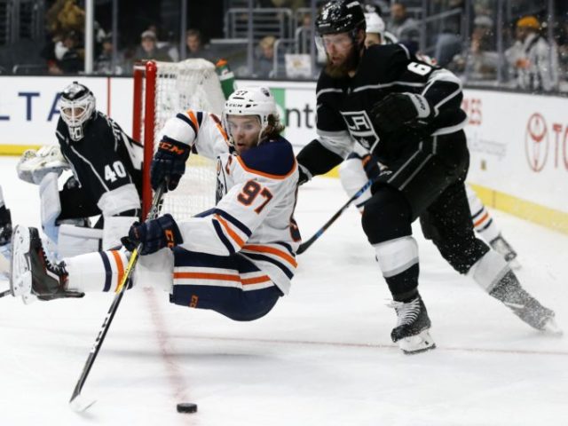 394230_connor mcdavid jake muzzin 676x507.jpg