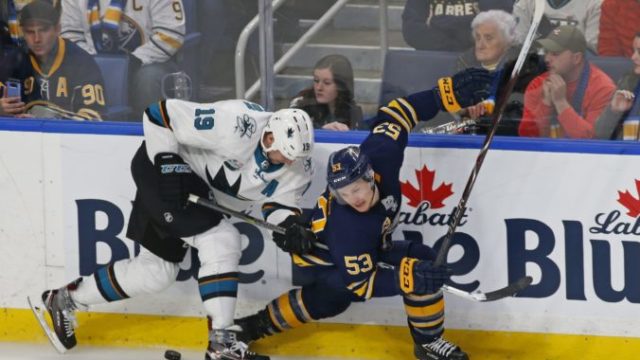 394577_jeff skinner joe thornton 676x466.jpg