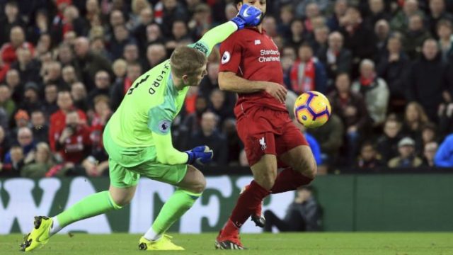 395135_mohamed salah jordan pickford 676x491.jpg