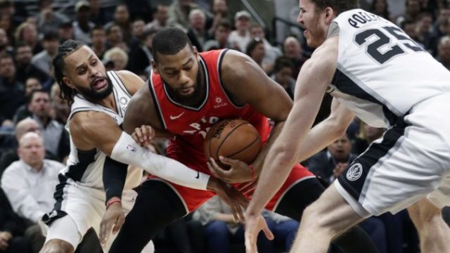 398213_greg monroe patty mills jakob poeltl 676x478.jpg