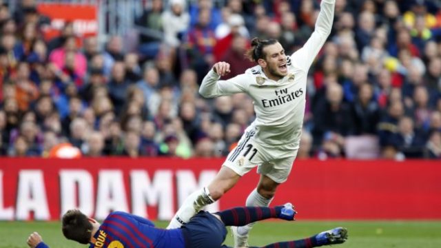 401474_gerard pique gareth bale 676x512.jpg