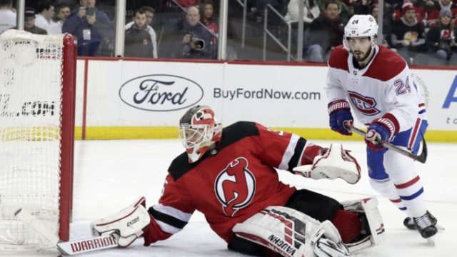 404165_cory schneider phillip danault 676x451.jpg