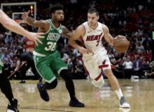 408434_marcus smart goran dragic 676x495.jpg