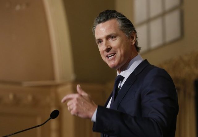 408881_newsom 676x467.jpg