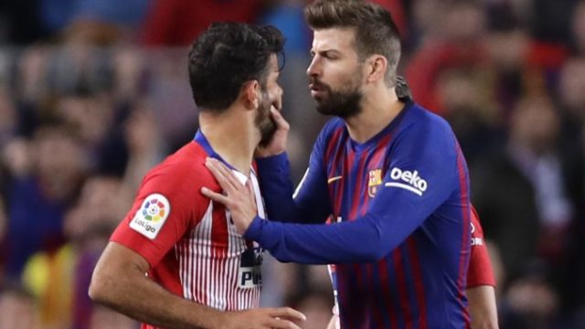 409350_gerald pique diego costa 676x451.jpg