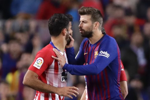 409350_gerald pique diego costa 676x451.jpg