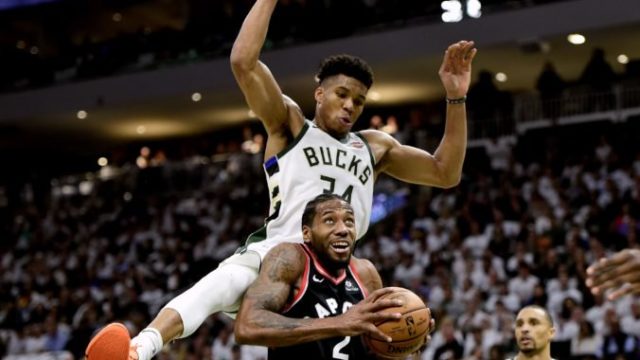 413162_kawhi leonard giannis antetokounmpo 676x507.jpg