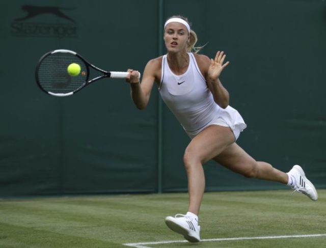 417883_britain_wimbledon_tennis_57068 9c91544018f24217b8a219374e977e00 1 676x514.jpg