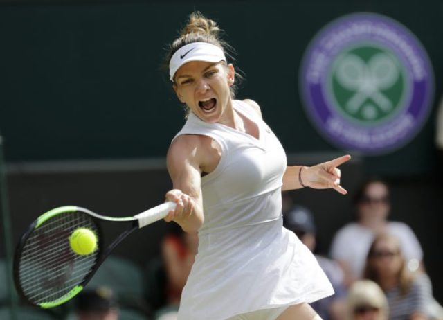 418275_britain_wimbledon_tennis_90895 20772e686db942cdb9ea9e5d3c8641d0 676x488.jpg