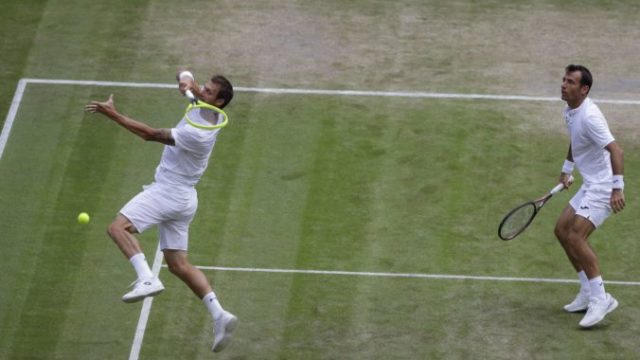 418951_filip polasek ivan dodig wimbledon 676x479.jpg