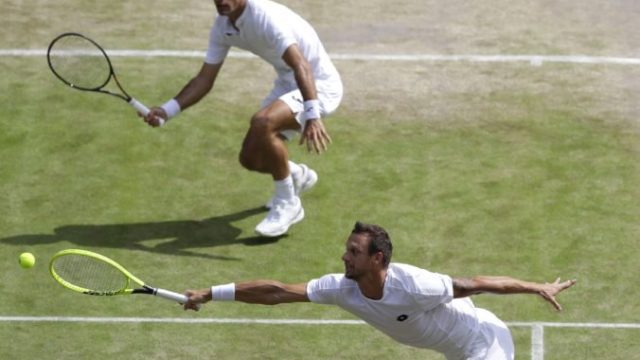 421814_ivan dodig filip polasek wimbledon 676x478.jpg