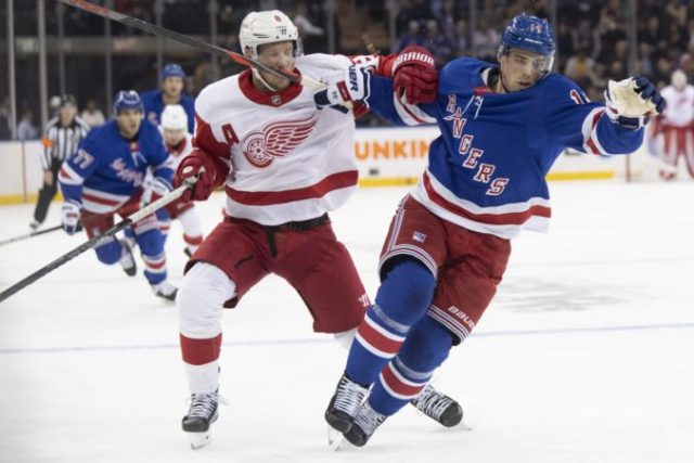 428736_greg mckegg justin abdelkader nhl detroit red wings new york rangers 676x451.jpg