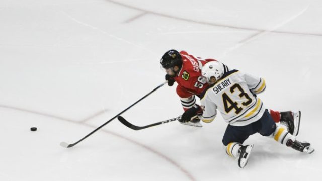 429552_erik gustafsson. conor sheary chicago blackhawks buffalo sabres nhl 676x451.jpg