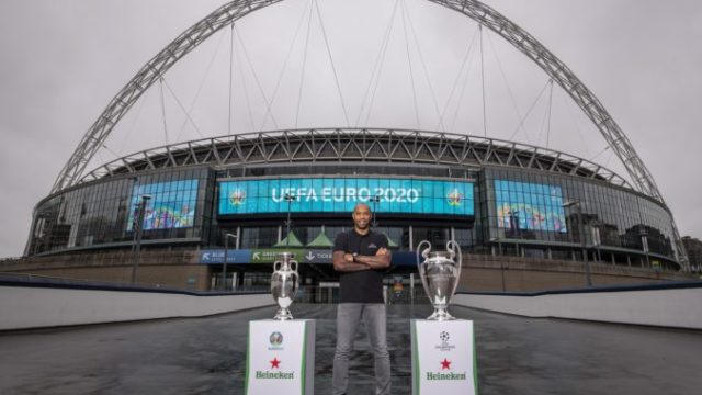 430756_henry with euro and ucl trophy with wembley arch backdrop 2 676x451.jpg