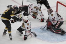 430955_sean kuraly calvin de haan brent seabrook robin lehner boston bruins chicago blackhawks nhl 676x451.jpg