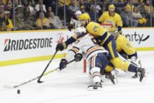 436395_connor mcdavid jarred tinordi edmonton oilers nashville predators nhl 676x451.jpg