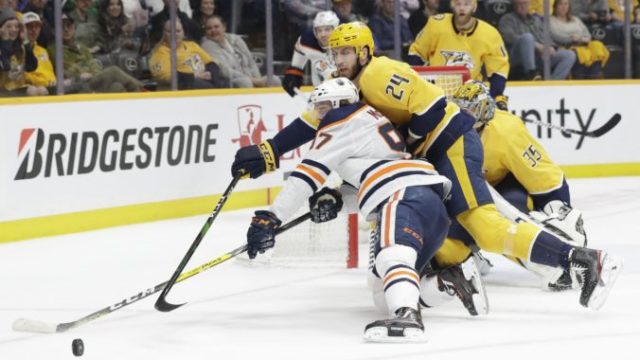 436395_connor mcdavid jarred tinordi edmonton oilers nashville predators nhl 676x451.jpg