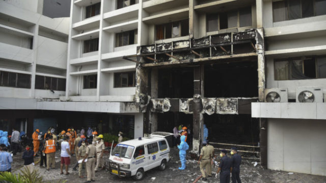 445851_virus_outbreak_india_fire_39552 7fd1ec9e4c064524a6e74a27b6e63c4b 676x451.jpg