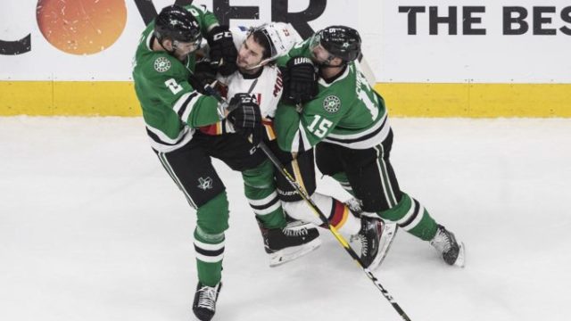 446162_sean monahan jamie oleksiak blake comeau dallas stars calgary flames nhl 676x418.jpg