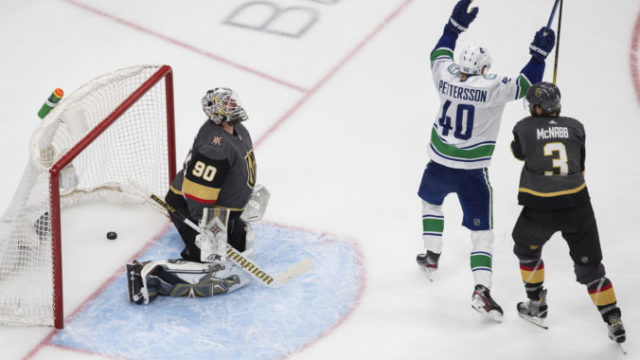 447316_canucks_golden_knights_hockey_39245 e61a3cd37c4148949c29096169772d9c 676x461.jpg