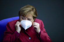 451205_virus_outbreak_germany_merkel_57163 f657ce6bae0845318ccc10398bccdb22 676x451.jpg