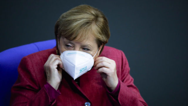 451205_virus_outbreak_germany_merkel_57163 f657ce6bae0845318ccc10398bccdb22 676x451.jpg