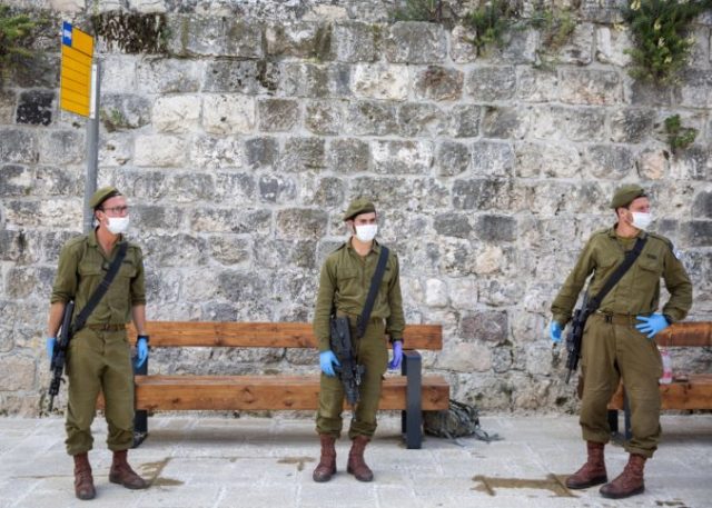 458747_virus_outbreak_mideast_israel_61937 e7ff31dd253644c68aa2a5feb2864ffa 676x483.jpg