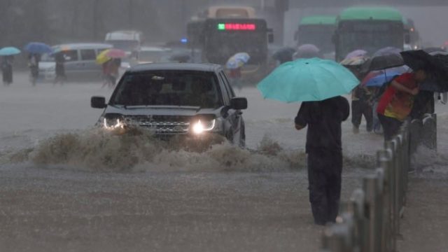 466711_china_flooding_40695 3808f589247c4e4bb6262cbd95466f80 676x451.jpg