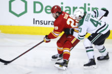 485462_stars_flames_hockey_83426 dd1d90a4b0184a609c4fb358753a6a5e 676x451.jpg