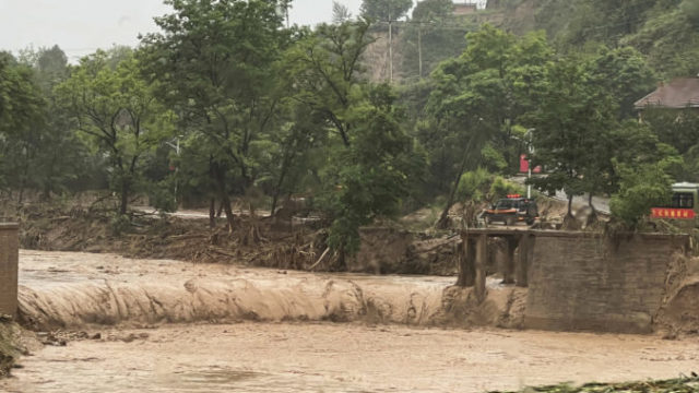 489145_china_floods_90382 93e8608b78b445bfb4a05eef383a695e 676x451.jpg