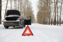 496171_man car winter walk car repair 676x451.jpg
