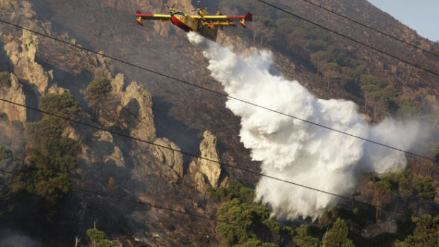 508326_italy_wildfires_40776 676x451.jpg