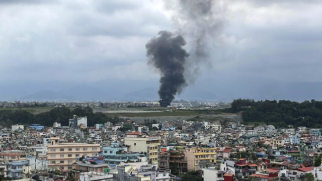 530033_aptopix_nepal_plane_crash_48130 676x507.jpg