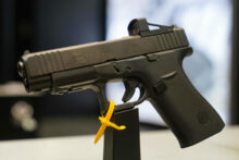 562719_pistol glock scaled 1 676x451.jpg