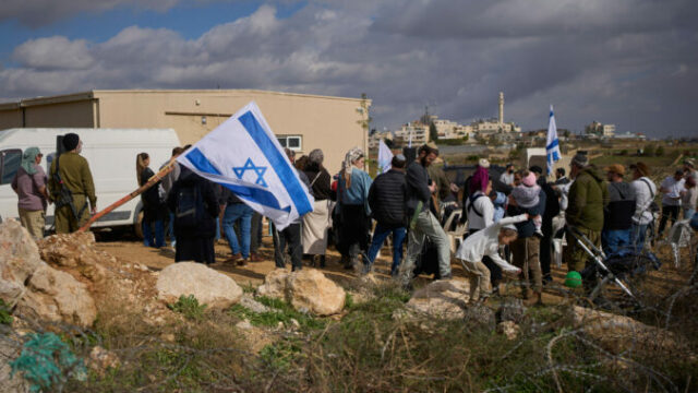 564259_mideast_wars_settlement_surge_50772 676x451 1.jpg