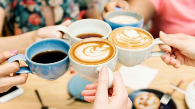 Friends having coffee together