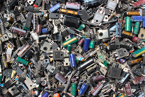 Burnt electronic components as technology waste background