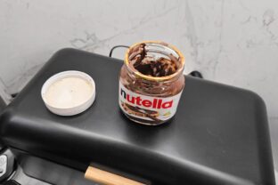 prázdny pohár od Nutelly