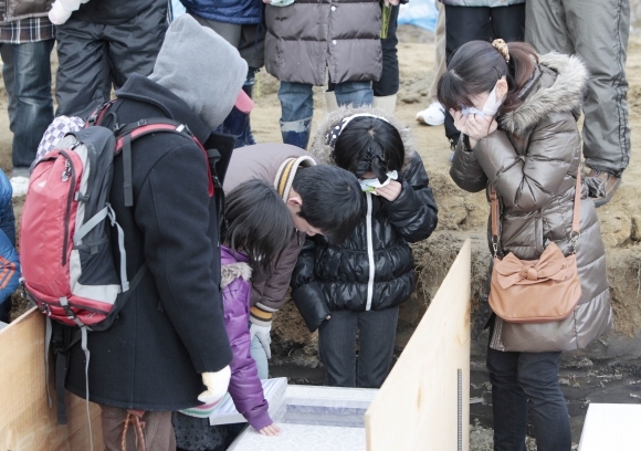 Pohreb prvých obetí katastrofy v Japonsku