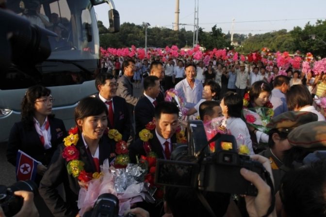 Olympionici KĽDR sa vrátili do vlasti